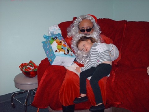 Blind Santa and a blind child